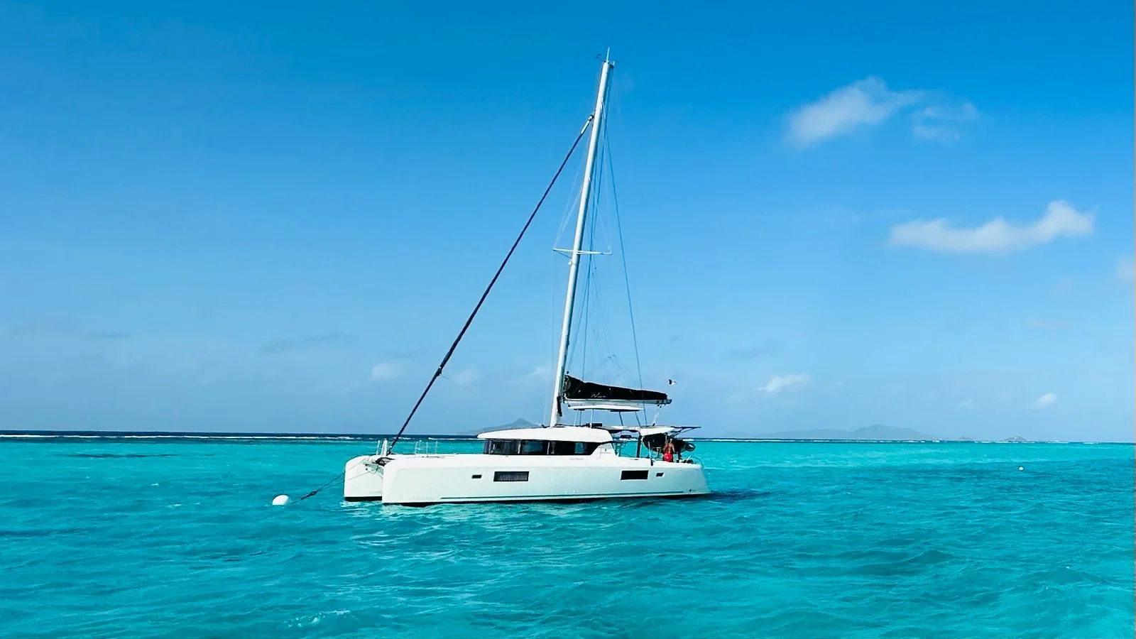 Catamaran anchored in turquoise Caribbean waters
